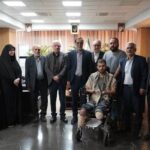 دیدار رئیس بنیاد شهید و امور ایثارگران با جانباز سرافراز حسین محمدی